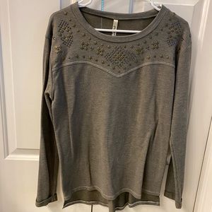 Long sleeve sweater size small, studded details.